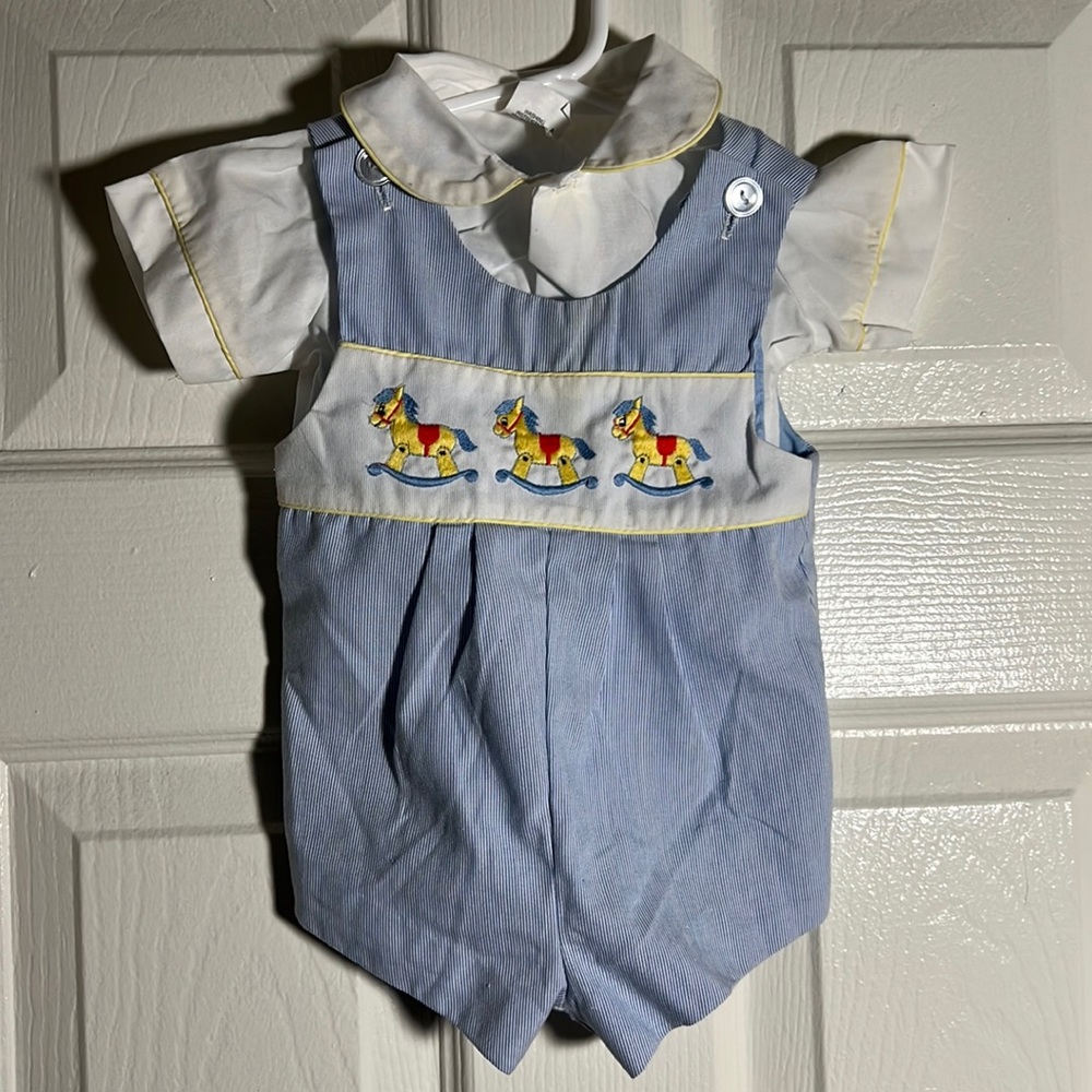 vintage blue outfit with rocking horses and a matching shirt underneath